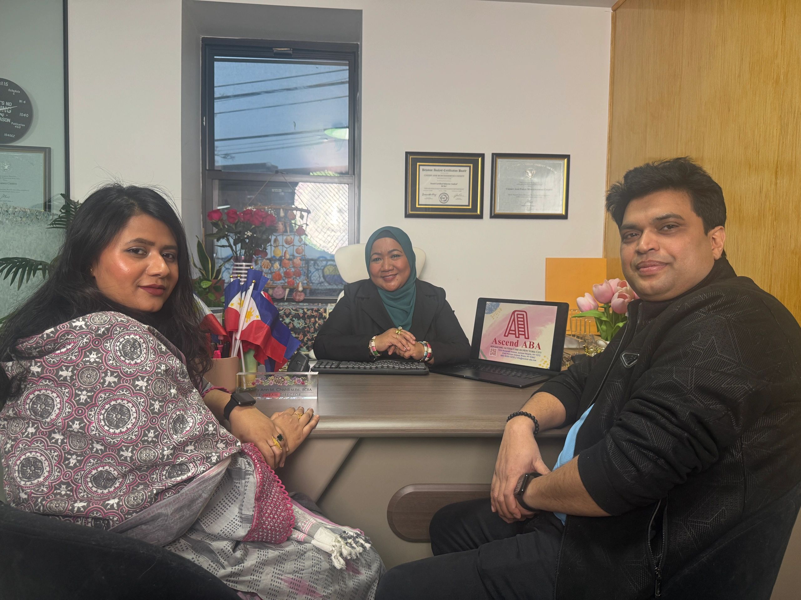 Ascend ABA team members gathered in an office